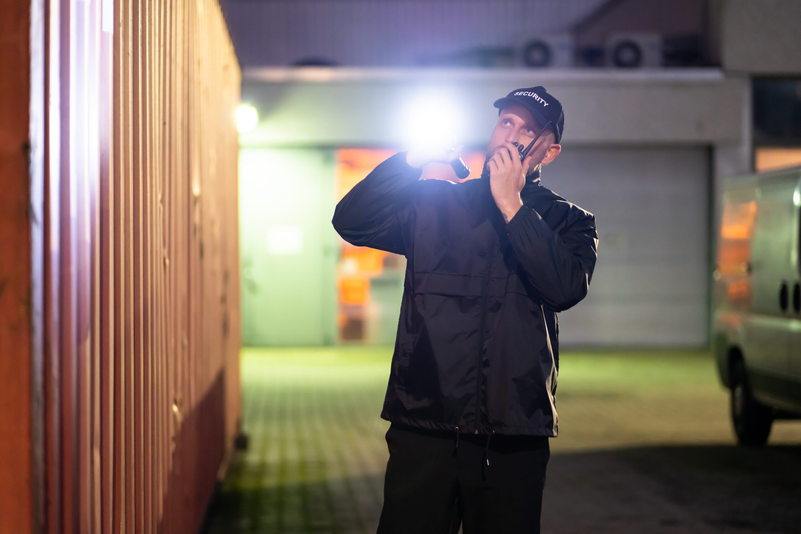 Security,Guard,At,Cargo,Container,Storage,Terminal,At,Night