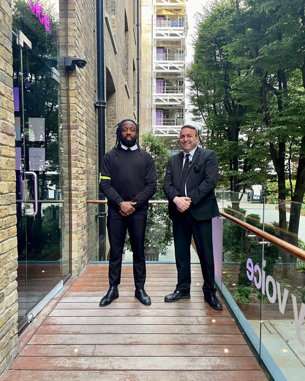 A photo of two SIA licensed door supervisors securing the entrance to a private event