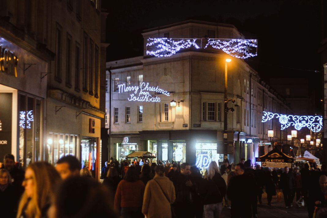 a photo of a busy late night shopping street in uk