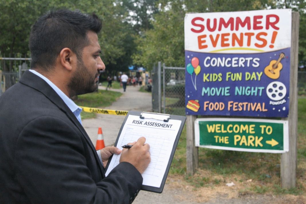An illustrative image of a security person conducting a site risk assessment outside a public park