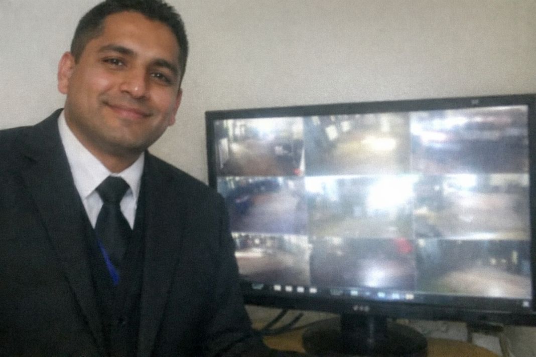 an ai photo of a cctv security officer