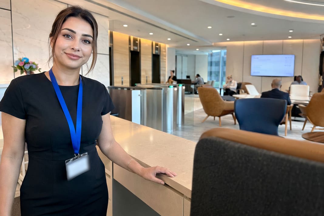 Corporate Reception Services At A Modern Office Welcome Desk - sample image