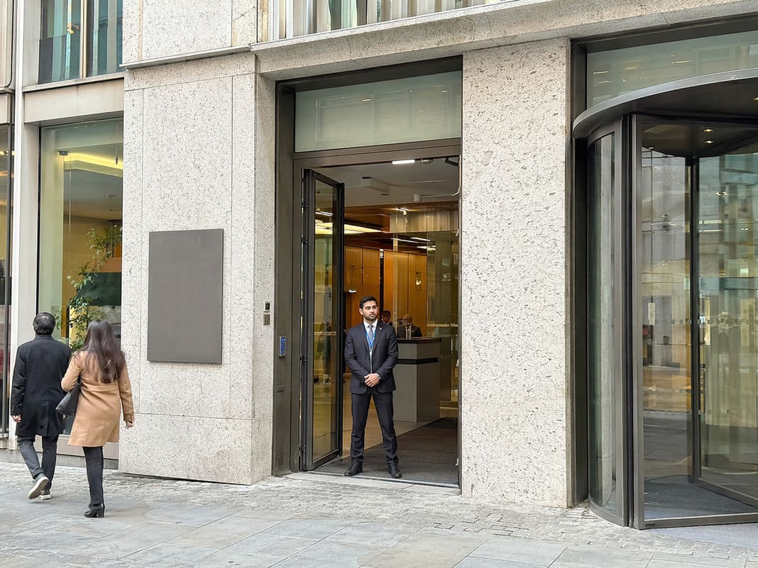 Corporate Security Services At A Main Building Entrance – sample image