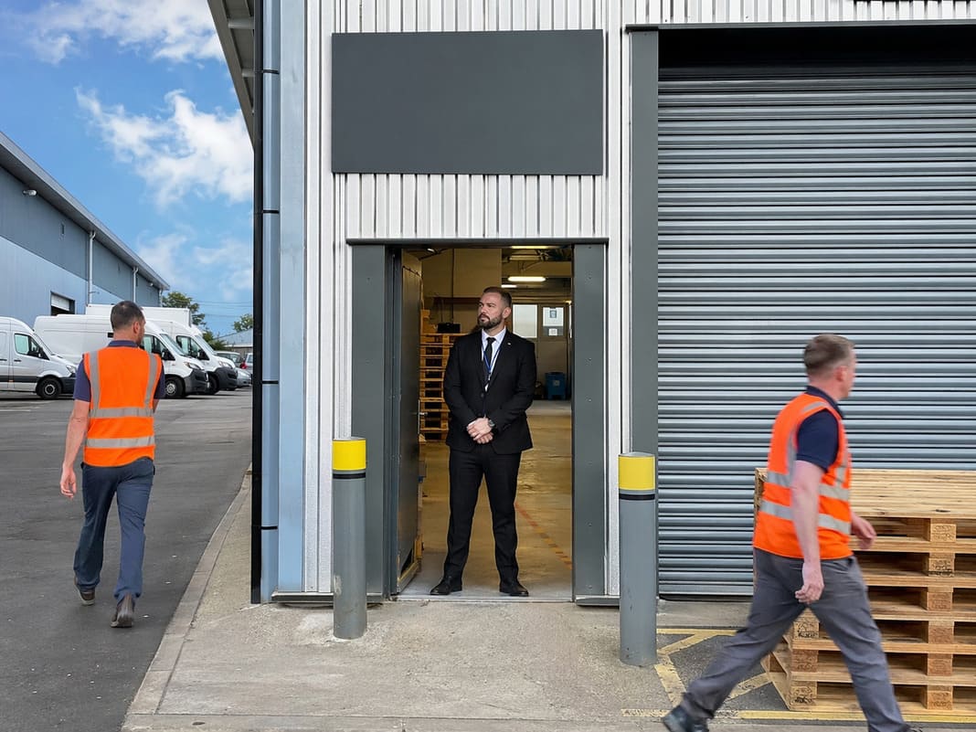 Industrial Warehouse Security Services At A Warehouse Entrance – sample image