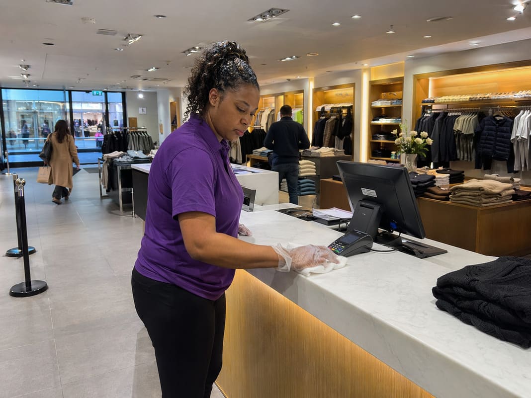 Retail Cleaning Services At A Store Counter Display - sample image