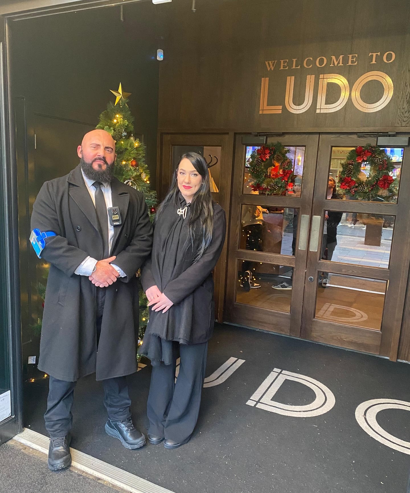 SIA licensed door supervisors protecting a venue entrance while delivering excellent customer service