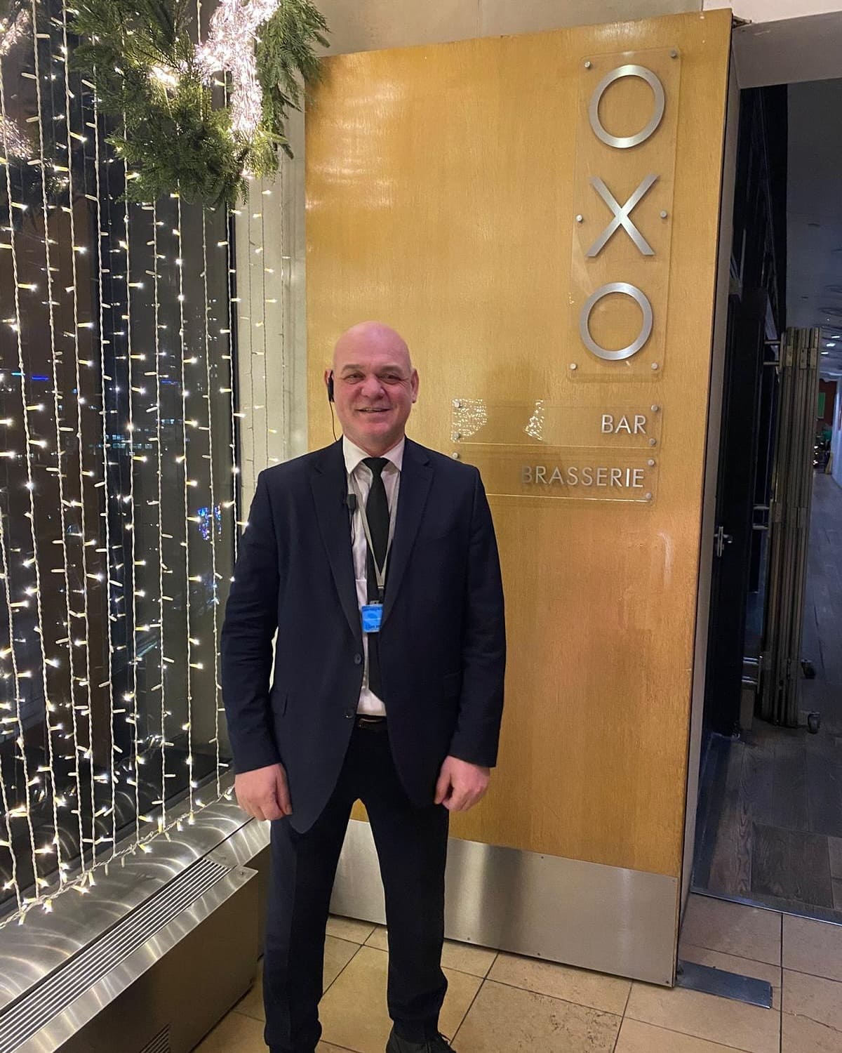 SIA licensed security officer safeguarding a hospitality venue entrance with customer-focused service
