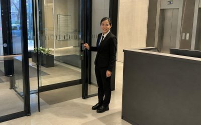 What does a concierge security officer do, and how is it different from a receptionist?