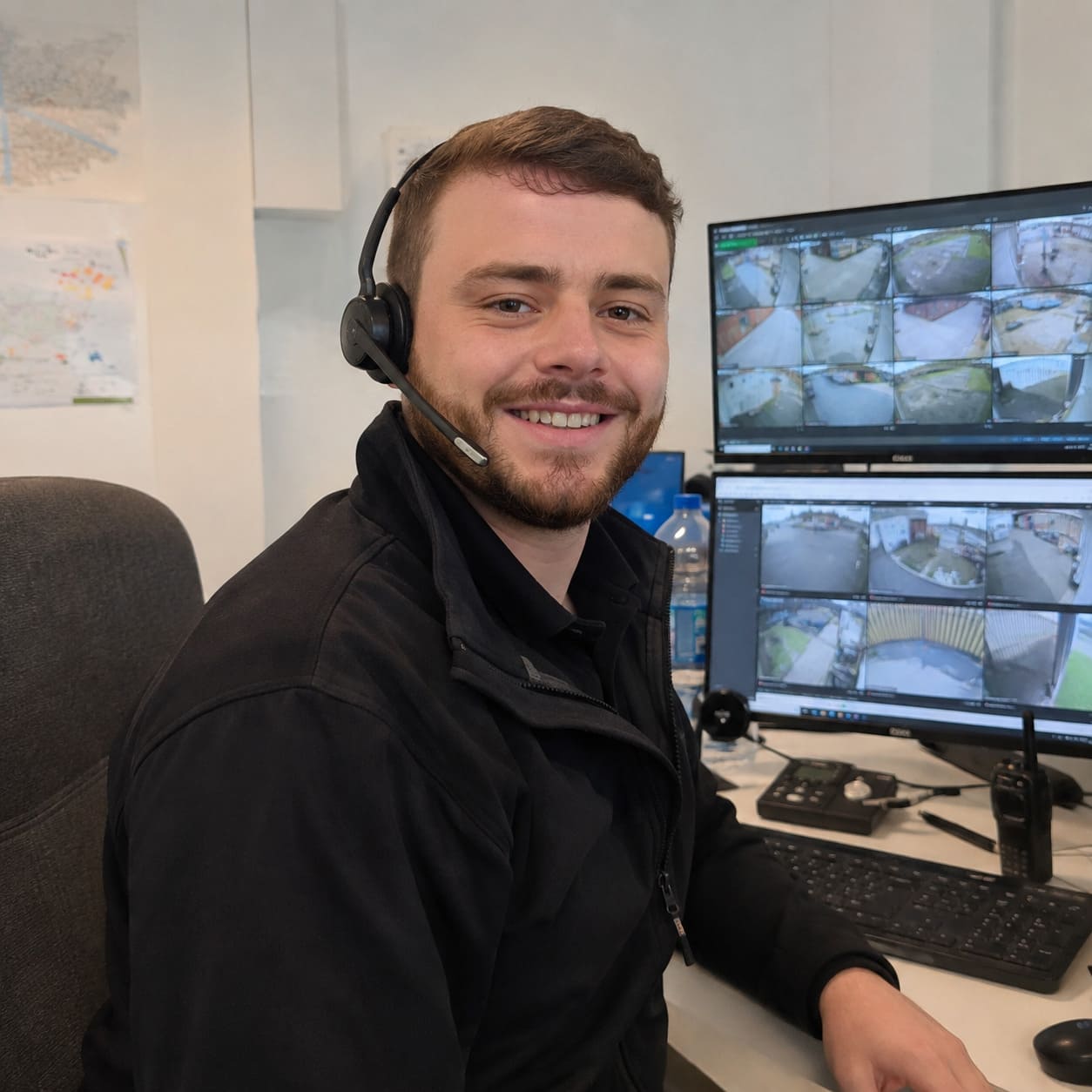 Security officer monitoring CCTV cameras from control room - Illustrative Image